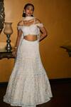 Buy Nadine Dhody Off White Tulle Crystals, Sequins, Embroidery Sophie Hand Lehenga Set at Aza Fashions Buy_Nadine Dhody_Off White Tulle Crystals, Sequins, Embroidery Sophie Hand Lehenga Set _at_Aza_Fashions