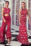Buy Diyarajvvir Red Georgette Tassels Round Neck Geometric Jaal Print Jumpsuit at Aza Fashions Buy_Diyarajvvir_Red Georgette Tassels Round Neck Geometric Jaal Print Jumpsuit _at_Aza_Fashions