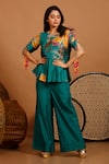 Buy_Garo_Blue Silk Muslin Printed Abstract Round Peplum Top And Flared Pant Set _at_Aza_Fashions