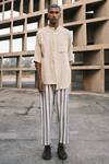 Buy_Urvashi Kaur_Off White Handloom Cotton Confulence Stripe Pattern Pant_at_Aza_Fashions