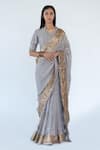 Buy_Nikita Vishakha_Grey Saree Georgette Embellished Mirror V Neck Work Gold Border With Blouse _at_Aza_Fashions