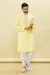 Buy_Samyukta Singhania_Yellow Cotton Plain Geometrical Placed Embroidered Kurta With Dhoti Pant _at_Aza_Fashions