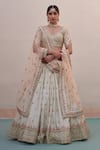 Angad Singh_Ivory Raw Silk Embroidery Zardozi Leaf Neck Floral Bridal Lehenga Set _at_Aza_Fashions