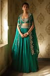 Buy_Mrunalini Rao_Green Silk Embroidery, Zari Scoop Neck Floral Cape Lehenga Set _at_Aza_Fashions