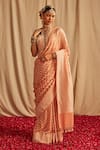 Buy_Paaprika_Peach Banarasi Georgette Handwoven Zari Floral Pattern Kadhua Saree  _at_Aza_Fashions