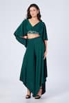 Buy_S&N by Shantnu Nikhil_Emerald Green Poly Jersey Plain Flared Trousers _at_Aza_Fashions