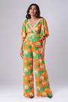 Buy_Tangerine Tiger_Orange 100% Rayon Crepe Printed Lotus V Neck Jumpsuit _at_Aza_Fashions