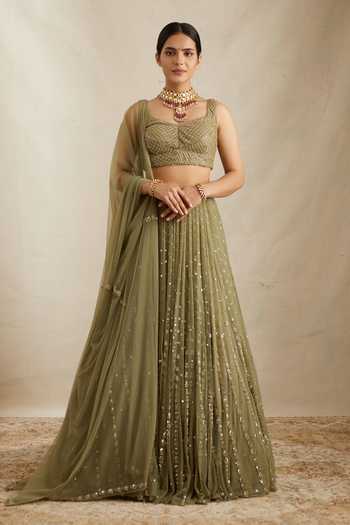 Buy_ASTHA NARANG_Green Net, Crepe, Nylon Embroidery, Sequins V-neck Botanic Bridal Lehenga Set _at_Aza_Fashions