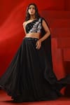 Buy_Isha Gupta Tayal_Black Crepe Embroidery Floral Asymmetric Neck Layered Lehenga And Blouse Set _at_Aza_Fashions