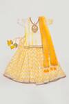 Buy_Yuvraani Jaipur_Yellow Silk, Net Embroidery, Tassels, Lace, Shibori Pattern Blouse Lehenga Set _at_Aza_Fashions