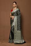 Buy_Samyukta Singhania_Black Georgette Woven Stripe Stiped Saree _at_Aza_Fashions