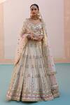 Buy_Angad Singh_Ivory Silk, Net Sequins, Cut Work Asymmetric Stripe Pattern Bridal Lehenga Set _at_Aza_Fashions