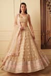 Buy_Sawan Gandhi_Gold Net Embroidered Sequins Square Neck Booti Bridal Lehenga Set _at_Aza_Fashions