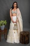 Buy_Priti Sahni_Ivory Silk, Tulle Sequins, Embellished Mirrorwork Blouse With Tiered Lehenga Set _at_Aza_Fashions