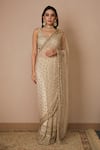 Buy_Astha Narang_Off White Net Embroidered Nakshi Scoop Neck Sequin Saree With Blouse For Women_at_Aza_Fashions