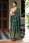 Buy_Dressfolk_Green 100% Linen And Zari Woven Stripe Henna Saree _at_Aza_Fashions