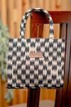 Buy NR By Nidhi Rathi Black Woven Geometric Pattern Textured Abstract Tote Bag at Aza Fashions Buy_NR By Nidhi Rathi_Black Woven Geometric Pattern Textured Abstract Tote Bag_at_Aza_Fashions