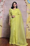 Buy_Shilpi Gupta_Yellow Organza Beads V-neck Border Embroidered Saree With Floral Detail Blouse _at_Aza_Fashions