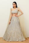Buy_Studio Iris India_Gold Organza Embroidery Crystal Asymmetric Stripe Lehenga Set _at_Aza_Fashions