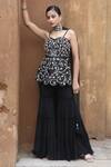 Buy_Nitisha Kashyap Official_Black Georgette, Net, Silk Mirrors, Embroidery, Floral Peplum Kurta Gharara Set _at_Aza_Fashions