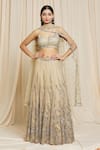 Buy Izzumi Mehta Beige Net Floral Plunge V Neck Hand Embroidered Lehenga Choli Set at Aza Fashions Buy_Izzumi Mehta_Beige Net Floral Plunge V Neck Hand Embroidered Lehenga Choli Set _at_Aza_Fashions