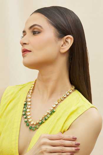 Buy_Just Shradhas_Gold Plated Circular And Drop Embellished Necklace _at_Aza_Fashions