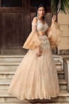 Shop_Nadine Dhody_Beige Tulle Hand Embroidered Pearl Work Pia Lehenga And Blouse Set  _at_Aza_Fashions