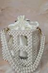 Buy_The Ashlee design co._Off White Embellished Acrylic Pearl Bag _at_Aza_Fashions