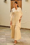 Buy_Palak & Mehak_Ivory Rayon Crepe Lurex Gota Stripe V Neck Mira Kaftan Top With Sharara _at_Aza_Fashions