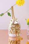 Buy_The Leather Garden_Ivory Holly Leather Mini Bucket Bag_at_Aza_Fashions