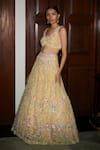 Buy_Nadine Dhody_Yellow Tulle Sequins, Cut Work, Embroidery Liliane Floral Bloom Lehenga Set _at_Aza_Fashions