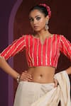 Buy_Weaver Story_Red Raw Silk Hand Embroidered Sequins Notched Striped Blouse _at_Aza_Fashions