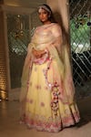 Buy_XOXO Apurva_Yellow Satin Organza Embroidered Floral Boat Carnival Lehenga Set  _at_Aza_Fashions