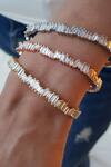 Buy_THE JEWEL FACTOR_Gold Plated Stone Baguettes Embellished Bangle_at_Aza_Fashions
