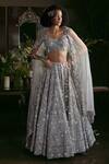 Buy_Kisneel by Pam_Purple Organza Embroidered Sequins V Neck Blouse Bridal Lehenga Set _at_Aza_Fashions