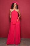 Buy_Style Junkiie_Fuchsia Moss Crepe Plain Halter Neck Flared Jumpsuit  _at_Aza_Fashions