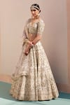 Buy_Angad Singh_Ivory Raw Silk Embroidery Zardozi Leaf Neck Floral Work Bridal Lehenga Set_at_Aza_Fashions