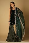 Buy_Monk & Mei_Emerald Green Kurta: Velvet Embroidered Floral Cyra Sharara Set For Women_at_Aza_Fashions