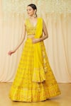 Buy_Khwaab by Sanjana Lakhani_Yellow Raw Silk Printed Floral Plunge Embroidered Choli With Lehenga Set_at_Aza_Fashions