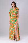 Buy_Tangerine Tiger_Orange 100% Rayon Crepe Lotus Print Slit Skirt _at_Aza_Fashions
