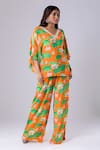 Buy Tangerine Tiger Orange 100% Rayon Crepe Lotus V Neck Print Top And Pant Set at Aza Fashions Buy_Tangerine Tiger_Orange 100% Rayon Crepe Lotus V Neck Print Top And Pant Set _at_Aza_Fashions