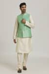 Buy_Samyukta Singhania_Green Jacquard Banarasi Silk Bloom Pattern Bundi And Kurta Set _at_Aza_Fashions