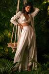 Buy_Pallavi Poddar_Ivory Satin Lycra And Net Embroidery Sequin V Floral Jacket & Wide Leg Pant Set _at_Aza_Fashions