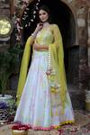 Buy_Nitisha Kashyap Official_Multi Color Net, Silk Mirrors, Embroidery Sweetheart Tie And Dye Lehenga Set _at_Aza_Fashions