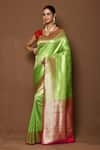 Buy_Nazaakat by Samara Singh_Green Banarasi Katan Woven Floral Contrast Pallu Saree_at_Aza_Fashions