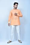 Buy_Samyukta Singhania_Orange Kurta Linen Cotton Contrast Collar And Pant Set_at_Aza_Fashions