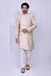 Buy_Nazaakat by Samara Singh_Beige Art Silk Jacquard Floral Woven Kurta And Churidar Set_at_Aza_Fashions