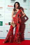 Buy_Krisha sunny Ramani_Red Georgette Jhumka Print Ruffle Pant Saree With Blouse_at_Aza_Fashions