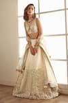 Buy_Studio Iris India_White Organza Embroidery Floral Leaf Neck Jasmine Bridal Lehenga Set _at_Aza_Fashions