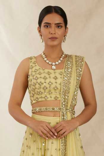 Buy_ASTHA NARANG_Yellow Net, Crepe, Nylon Embroidery, Cut Work, Flower Bridal Lehenga Set _Online_at_Aza_Fashions